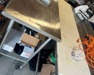 Choice of 2 stainless work tables. The one with cutter top buy it right now for $390.00. The stainless top is $200.00 buy them right now prices.