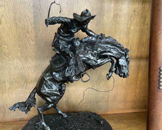 Bronco Buster - Remington Remington Early Bronco Buster After Remington
***Bronco Buster - After Frederic Remington***Size 24x18
$1200
This is a genuine bronze sculpture created in the lost wax method and has a beautiful patina. It sits on a fine Italian marble base
Condition
This is one of the finest reproductions of Remington in mint condition. Size 24x18. This is a genuine bronze sculpture created in the lost wax method and has a beautiful patina. It sits on a fine Italian marble base (1861-1909) Frederic Remington depicted the life of a cowboy during the late 1800s. He was born in New York, later operated his farm in Kansas and returned to New York. He had a real horsemans knowledge of a horse. He is world reknown for his wonderful western bronzes. He first made his name as a painter and illustrator then a sculptor.