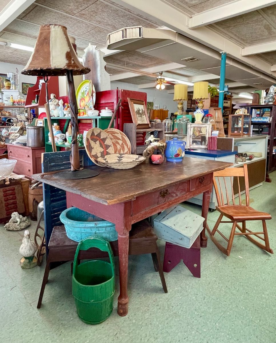 1700’s Pennsylvania Dutch Table with Drawers, Rifle Stock Lamp, Southwest Woven Baskets, 2 Handled Bean Pot Cookie Jar, Vintage Wood Water Pail, Vintage Stools