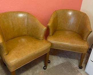Pair of Mid Century Modern Cognac Vinyl Rolling Chairs