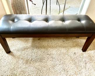 Black tufted bench