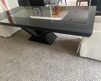 Black lacquer pedestal table with glass insert