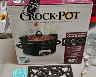 TOASTER, CROCK POT, CAST IRON TRIVETS