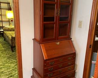 #51 Secretary w/2 glass doors w/2 wood Shelves 4 drawers w/flip-down desk w/cubbies 27x17-26.5x77 $275.00