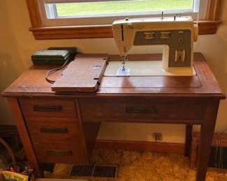 #23 Singer Sewing Machine in Cabinet w/2 drawers $60.00