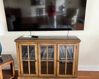 Glass front console cabinet. 83” Samsung 85” TV - one year old. 