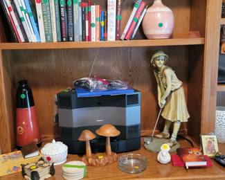 BOSE System, Golf Lady Statue and books