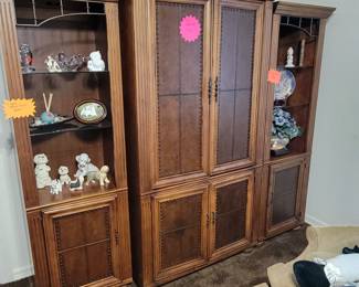 2 Lighted bookcases, center cabinet has tv mount.