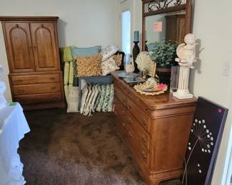 More of the bedroom suite, pillows, chair cushions and decorative items.