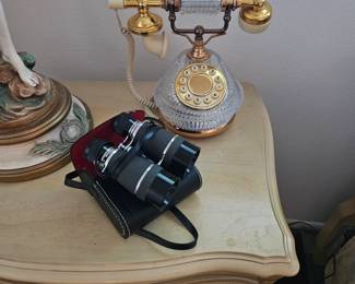 Binoculars and Vintage Telephone