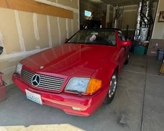 1994 Mercedes SL500 Two-Door Convertible! Asking $25,000!! 30,000 original miles, red matching removable hard top, perfect black soft top, immaculate tan interior