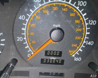 1994 Mercedes SL500 Two-Door Convertible! Asking $25,000!! 30,000 original miles, red matching removable hard top, perfect black soft top, immaculate tan interior