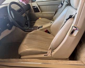 1994 Mercedes SL500 Two-Door Convertible! Asking $25,000!! 30,000 original miles, red matching removable hard top, perfect black soft top, immaculate tan interior