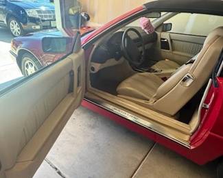 1994 Mercedes SL500 Two-Door Convertible! Asking $25,000!! 30,000 original miles, red matching removable hard top, perfect black soft top, immaculate tan interior