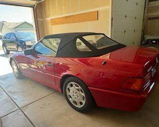 1994 Mercedes SL500 Two-Door Convertible! Asking $25,000!! 30,000 original miles, red matching removable hard top, perfect black soft top, immaculate tan interior