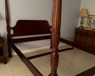 Solid mahogany carved 4 poster bed.