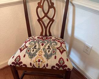 One of solid mahogany Chippendale style dining chairs.