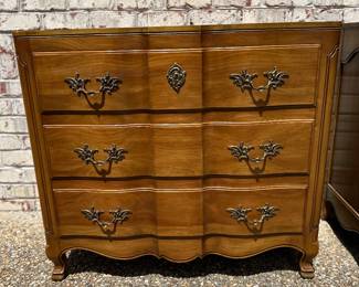 One of a pair of matching John Witticomb walnut bachelors chests. 