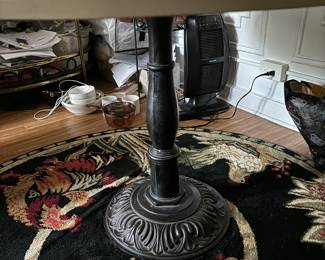 marble table, wrought iron stand