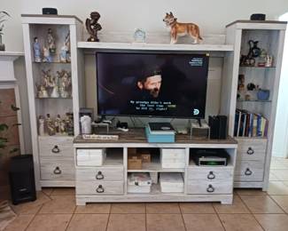 Entertainment center.  Televisions.  