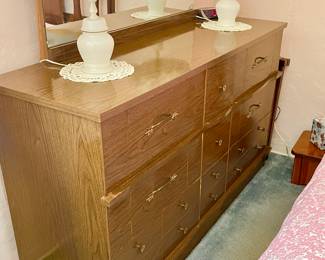 MCM 9 drawer dresser. Cute vintage lamps on top.