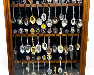 Collection Of Souvenir Spoons From World Travels In Wood Display Case (35 Pieces)
Lot #: 1