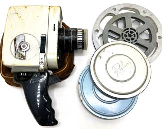 Vintage Bauer 88L Super 8 Movie Camera In Original Leather Sleeve & Film Reels
Lot #: 7
