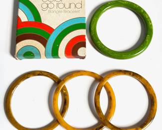 4 Vintage Bangle Bracelets Including 1977 Avon In Original Box
Lot #: 123