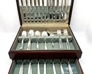 Collection Of Souvenir Spoons From World Travels In Wood Display Case (35 Pieces)
Lot #: 1