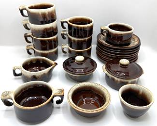 Vintage Brown Drip Glazed Pottery: 8 Mugs, 8 Saucers, Creamers, Sugar Bowls & Other Small Bowls
Lot #: 10