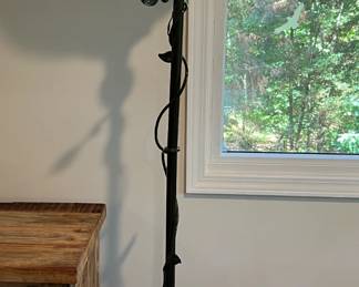 Metal pole lamp with frosted shade