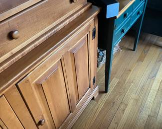 Bottom of early American style china cabinaet