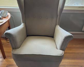 One of a pair of wing back chairs