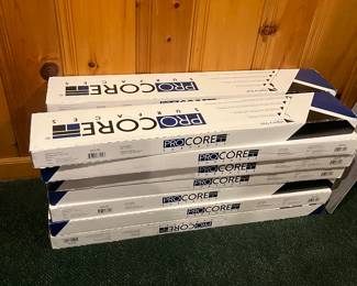 Twelve boxes of Procore floor tiles