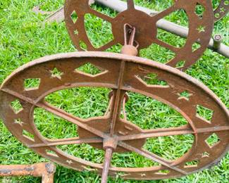 Several Cast Iron Wheels in Different Sizes & Designs 