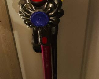 TWO Dyson rechargable  vaccums 