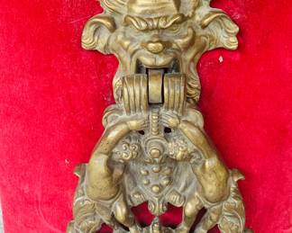 19th century Italian/ French  door knocker featuring grotesque gargoyles and puttis (cherubs)