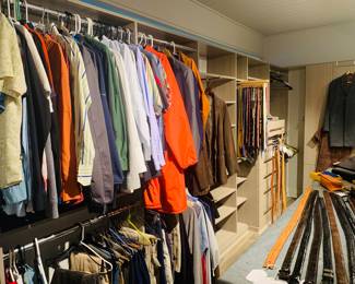 Magnificent closet filled with Designer mens and women’s clothing including Prada, Versace, St John, & Euro