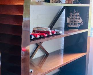 one of two  four shelf Modern style shelves