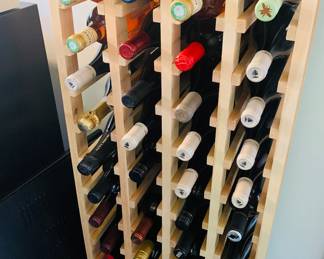 wine rack with many bottles of fine wines
