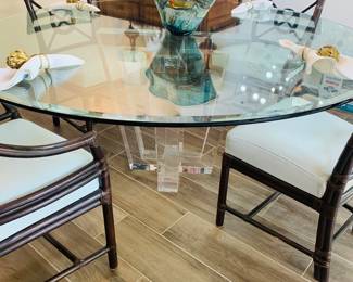 gorgeous round glass top table with chairs by McGuire. 