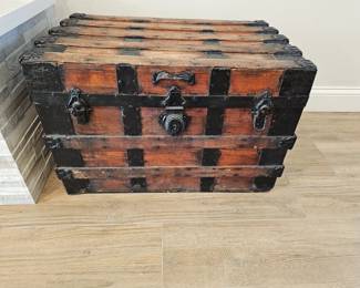 Victorian flat top steamer trunk.
