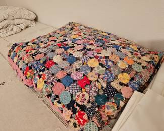 Hand stitched yo-yo quilt