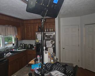 View 1 of 2.  Viltrox VL-200T Portable LED Dimmable Studio Photography Light Counter full of kitchen supplies