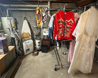 Wedding Dress and Veil; Mens and Women’s Clothes; Kerosene Hearer; Space Heater; Kenmore 50pint Low Temp De-Humidifier; Box Fan; Ironing Board; Irons; Vintage Mens Right Handed Golf Clubs and Bag; Golf Shoes; Sad Irons; Laundry basket w/ Hangers; (Washing Machine & Dryer NOT for sale) 