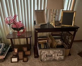 Sofa Table; Side Table; Brass Table Lamp; Picture Frames; Floral Arrangements