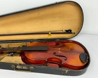 Antique Violin with Pernambuco 

A special note from the client, "This violin was my father's and was used to learn to play at Sacred Heart Church in north Minneapolis. The bow is made from Pernambuco wood, is in good shape and has mother of pearl inlays. I believe the violin can be restored to play again but it would need to be evaluated."

Includes the bow, violin and case