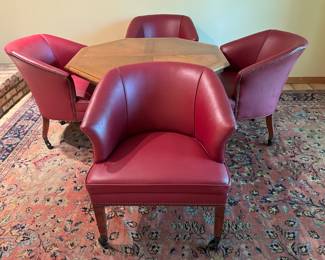 Vintage Ethan Allen Game Table and Set of Four Leather Club Chairs

The table measures 47" x 28" 