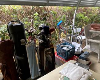 old golf clubs, some tools, medical equipment