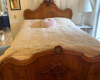 unique beautiful ornate bed. carving on side panels also